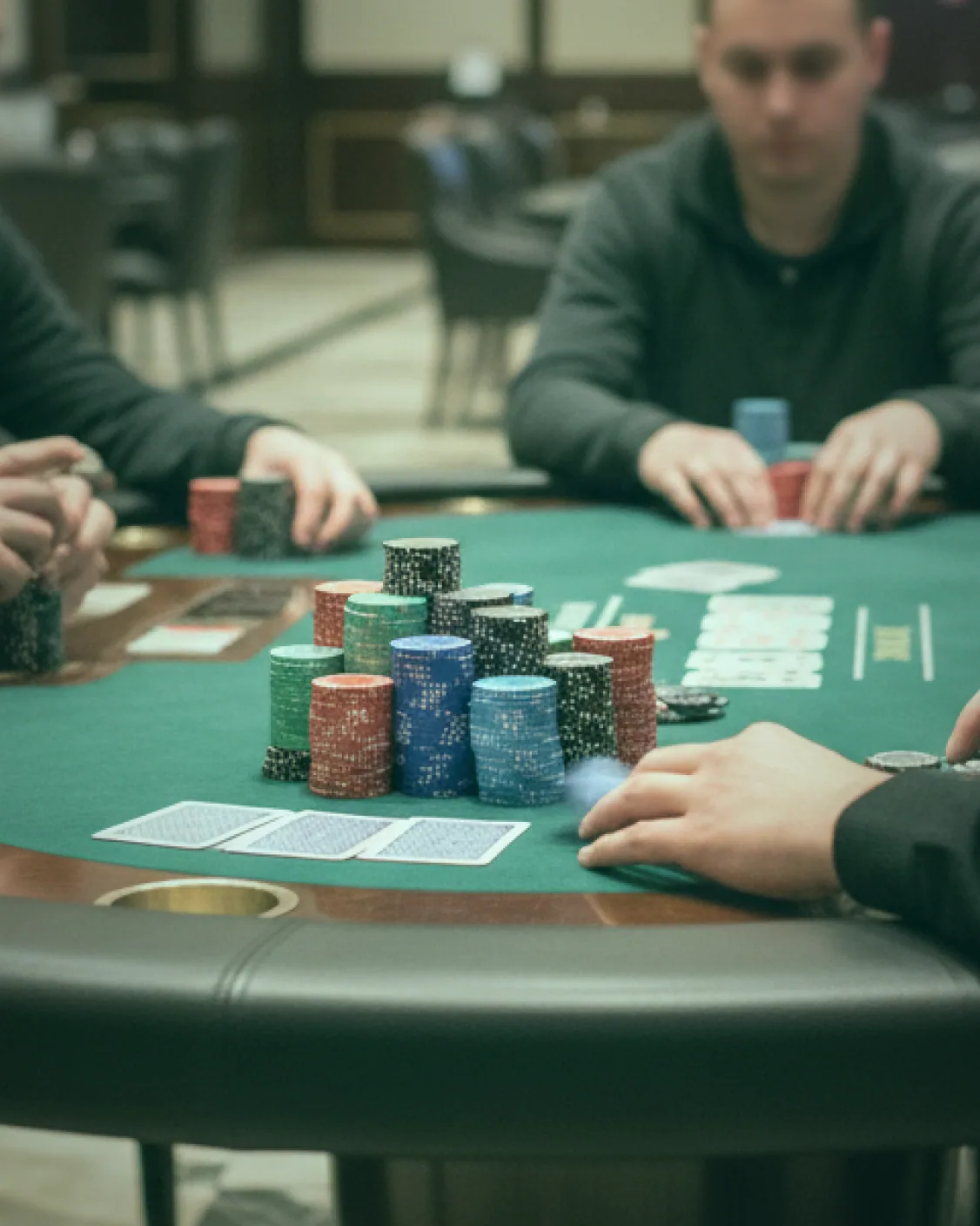 Chips stacked on the felt, marking points rather than cash